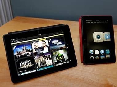 The 8.9-inch Amazon Kindle HDX tablet computer is shown at left next to the 7-inch Amazon Kindle HDX. AP 