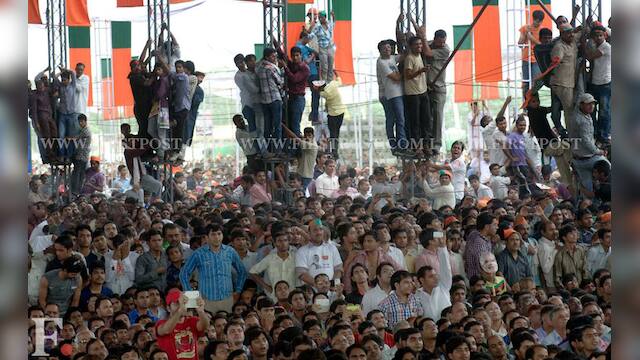 Photos: Narendra Modi woos audience at BJP Delhi rally – Firstpost