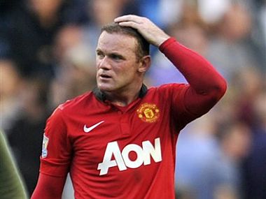 Van Gaal plays down Rooney injury after United 2-1 victory over Stoke Van Gaal plays down Rooney injury after United 2-1 victory over Stoke