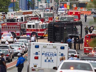 A Emergency Response Team vehicle arrives to the scene where a gunman was reported at the Washington Navy Yard in Washington. AP