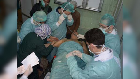 Privately, UN talks begin on Syria chemical arms resolution