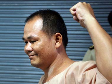 Thai court acquits man accused of defaming king Thai court acquits man accused of defaming king