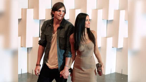 Ashton Kutcher travels with ex-wife Demi Moore 