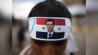 Russia, Syria urge US not to launch military strikes