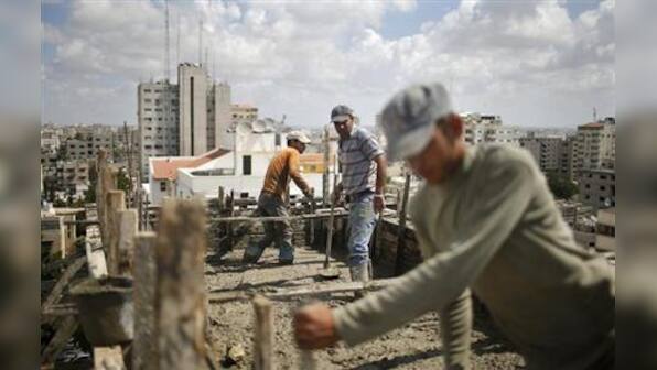 Israel allows more building material into Gaza – Firstpost
