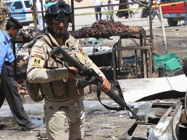 Bombs in shopping areas around Baghdad kill 21, wound dozens Bombs in shopping areas around Baghdad kill 21, wound dozens