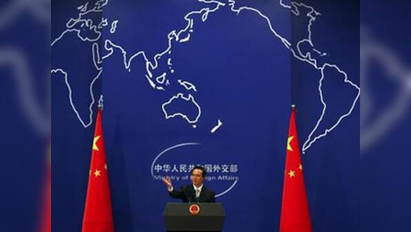 China backs Russia's proposal for Syria to handover weapons