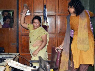Parents vandalising the school. PTI. 