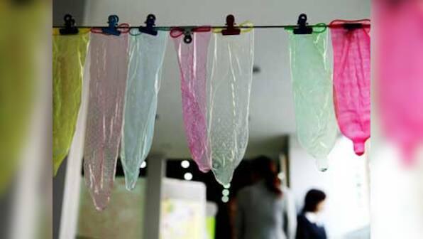 German firm apologises for producing anti-immigrant condoms