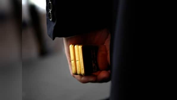 Gold nudges up after prices dip amid fears of looming US tariffs on China