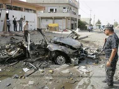 Suicide bombers kill six officers in Iraqi police station Suicide bombers kill six officers in Iraqi police station