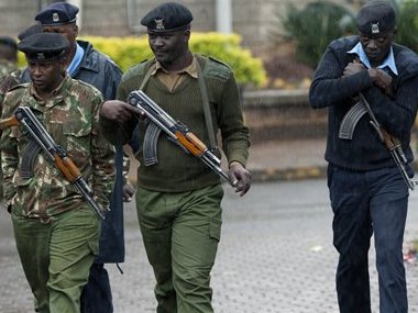 Kenyan army soldiers and police officers patrol near the Westgate Mall. AP image