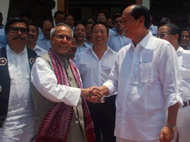 The Congress wants President's rule in Nagaland. Seen here is the President Pranab Mukherjee with the Nagaland CM Neiphui Rao. AFP. 