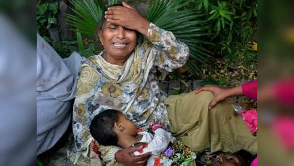 Pakistani Christians denounce church bombings, 81 reported dead