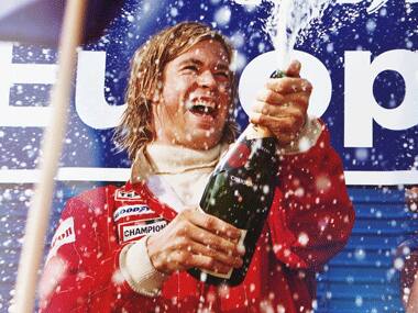 Chris Hemsworth as F1 racer James Hunt. 