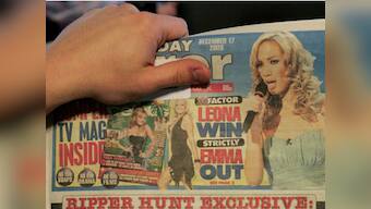 Publishers of UK's Sunday Mirror being questioned over phone hacking 