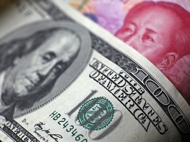 China's yuan weakens against US dollar China's yuan weakens against US dollar
