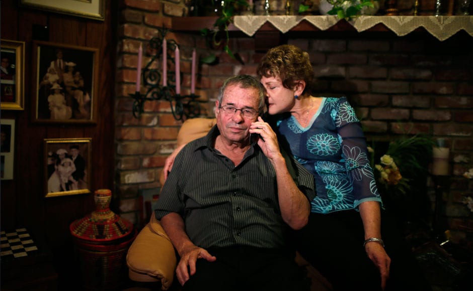 University of Southern California professor Arieh Warshel (L) talks on the phone with Israeli President Shimon Peres as he sits with his wife Tami Warshel after hearing he won the Nobel chemistry prize in Los Angeles, California October 9, 2013. Warshel, a U.S. and Israel citizen, won the Nobel chemistry prize with U.S. scientists Martin Karplus and Michael Levitt on Wednesday for pioneering work on computer programs that simulate complex chemical processes and have revolutionised research in areas from drugs to solar energy. The Royal Swedish Academy of Sciences, awarding the prize of 8 million crowns ($1.25 million) to Karplus, Levitt and Warshel, said their work had effectively taken chemistry into cyberspace. Long gone were the days of modelling reactions using plastic balls and sticks. REUTERS/Lucy Nicholson University of Southern California professor Arieh Warshel (L) talks on the phone with Israeli President Shimon Peres as he sits with his wife Tami Warshel after hearing he won the Nobel chemistry prize in Los Angeles, California October 9, 2013. Warshel, a U.S. and Israel citizen, won the Nobel chemistry prize with U.S. scientists Martin Karplus and Michael Levitt on Wednesday for pioneering work on computer programs that simulate complex chemical processes and have revolutionised research in areas from drugs to solar energy. The Royal Swedish Academy of Sciences, awarding the prize of 8 million crowns ($1.25 million) to Karplus, Levitt and Warshel, said their work had effectively taken chemistry into cyberspace. Long gone were the days of modelling reactions using plastic balls and sticks. REUTERS/Lucy Nicholson