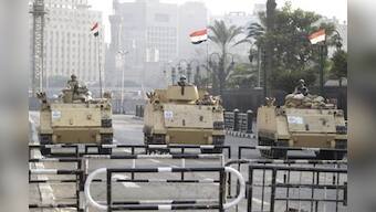 US quietly observes coup law on Egypt aid, but shuns term