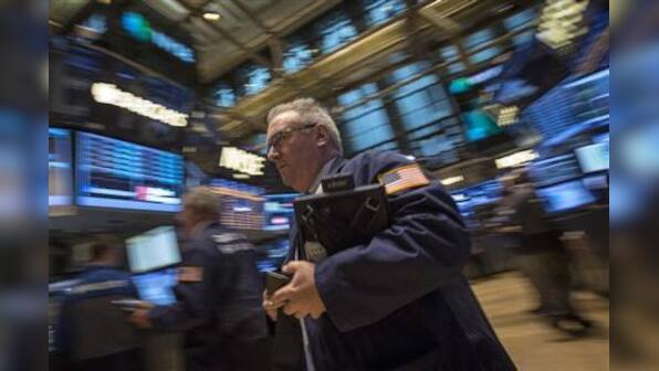 U.S. dollar sags as Fed support, China growth lift shares