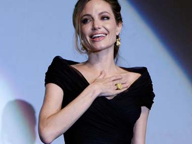Angelina Jolie's double rings ignite rumours of secret wedding Angelina Jolie's double rings ignite rumours of secret wedding