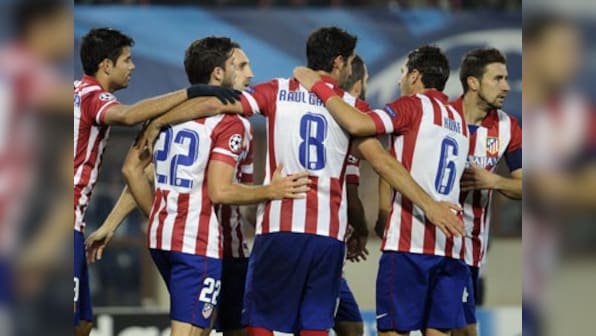 Champions League glance: Napoli, Atletico on song; Porto stumble