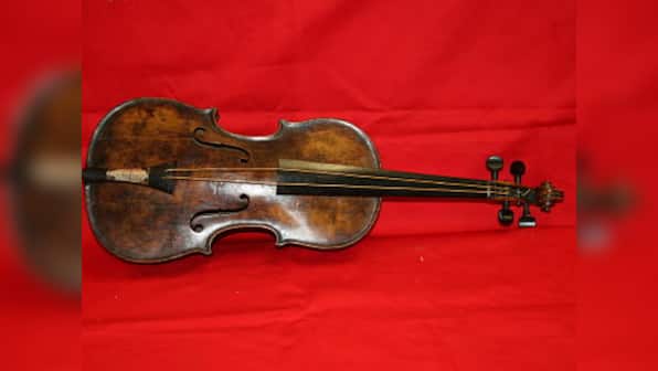 Violin that played as Titanic sank fetches over $1.6 mn at auction 