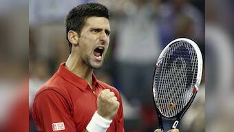 Shanghai Open: Djokovic rallies to beat Monfils and reach semis
