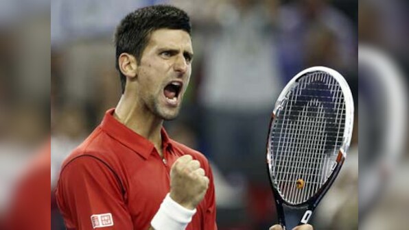 Shanghai Open: Djokovic rallies to beat Monfils and reach semis