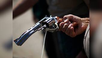 US military recruiter held for shooting superiors