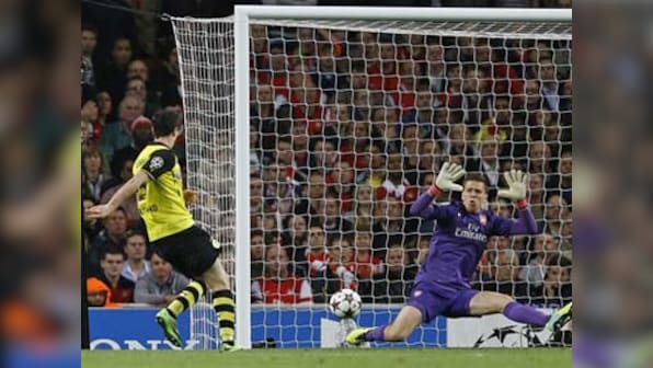 Lewandowski sucker punch helps Dortmund sink Arsenal