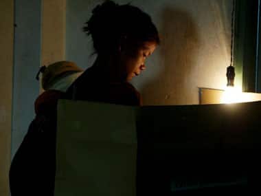 A Mizo woman with her child votes in the 2008 Assembly polls. AFP