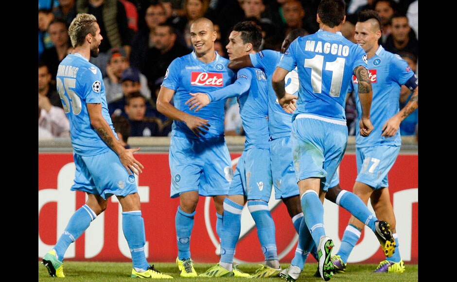 Napoli's Jose Callejon (C) celebrates with team mates after scoring the first goal for the team during their Champions League soccer match against Olympique Marseille at the Velodrome stadium in Marseille, October 22, 2013. REUTERS