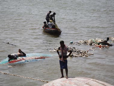 One lifeboat and a mobile: How 18 sailors survived Phailin's fury One lifeboat and a mobile: How 18 sailors survived Phailin's fury