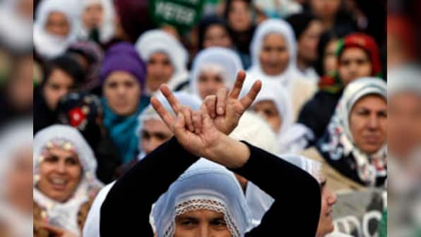 Turkey lifts ban on head scarf, secularists say govt pushing Islamic agenda