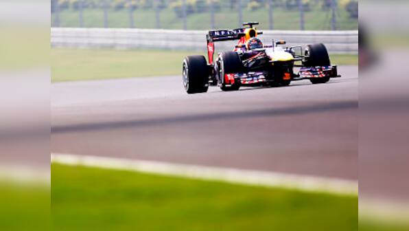 India GP: Vettel leads Red Bull one-two in first practice