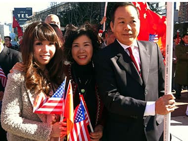 In this file photo, Chinese-American businessman Vincent Wu poses with his family. AP