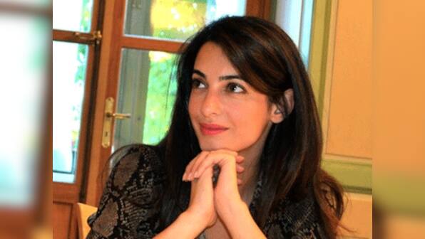 George Clooney dating Julian Assange's lawyer?