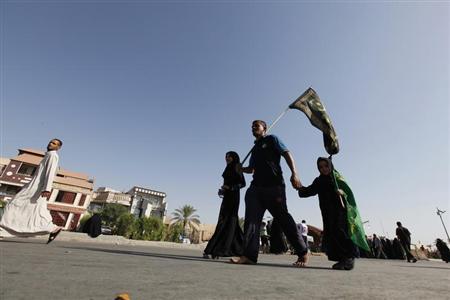 Suicide bomb attacks on Iraqi school, Shi'ite pilgrims, kill 29 Suicide bomb attacks on Iraqi school, Shi'ite pilgrims, kill 29