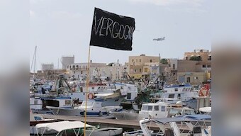 Italian coast guards still recovering hundreds of migrants missing after shipwreck