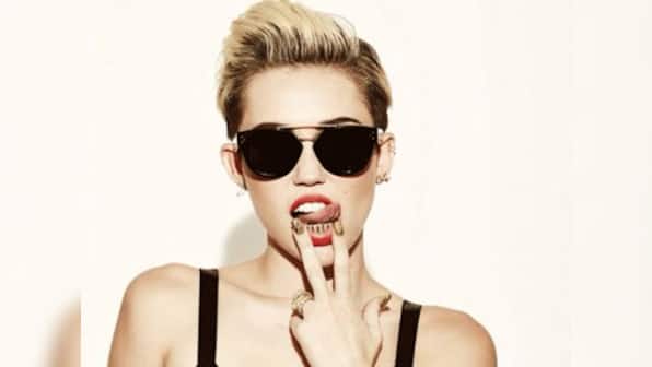 Twerking isn't cool anymore, says Miley Cyrus during Saturday Night Live performance