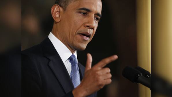 Obama pressures Boehner to help avoid default, reopening federal govt