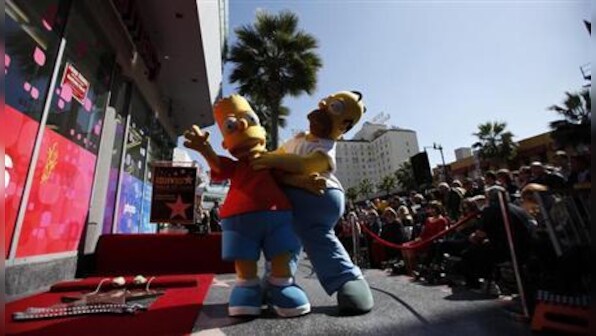 Watch more of Homer and Bart: The Simpsons renewed for 26th season