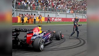 Vettel wins fourth straight F1 title after triumph at Indian GP