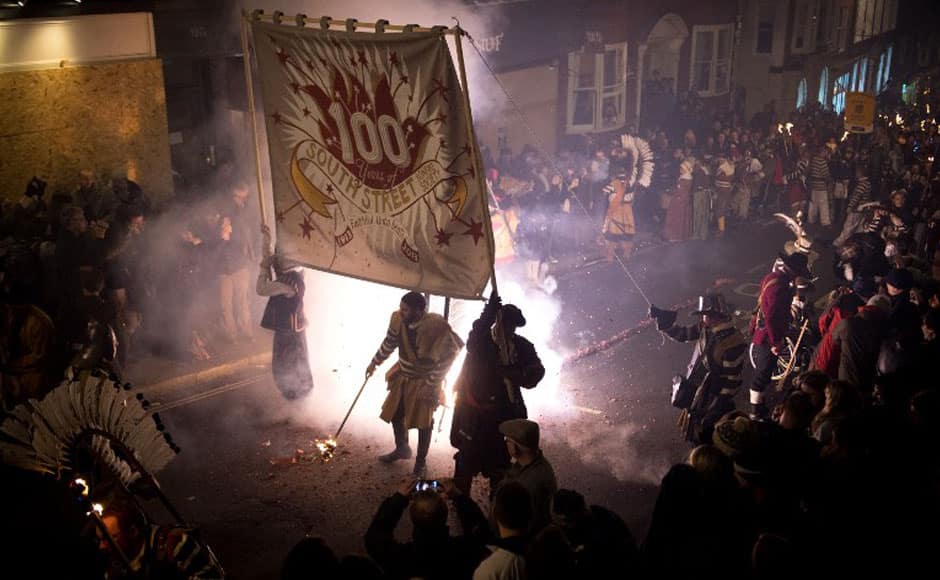 Bonfire societies parade through the streets during the Bonfire Night celebrations on November 5, 2013 in Lewes, Sussex in England. AFP