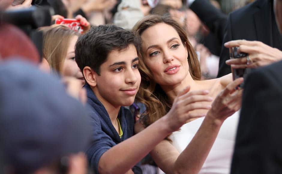 In sharp contrast to Tom Hank's mania and Steve Martin's naked fear, here we have a young fan posing with Angelina Jolie, all the while sporting a blase expression that seems to say 'I could be at home watching Game Of Thrones right now'. Jolie is surprisingly adept at the art of selfies - note the perfect alignment of the phone and their faces - for someone who once claimed to be so technologically-challenged that she couldn't even use a computer.