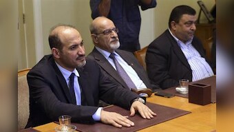 Syria opposition accepts peace talks, says Assad must go