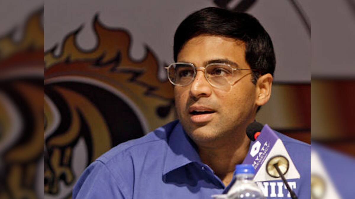 Playing Carlsen was like playing a human computer: Anand – Firstpost