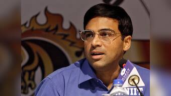 Playing Carlsen was like playing a human computer: Anand