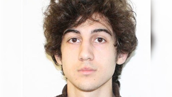 Lawyers of accused Boston bomber say he scrawled messages expecting death